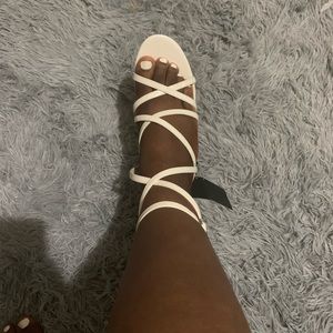 White strappy faux leather heels